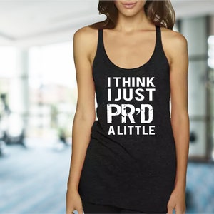 May include: Black tank top with white text that reads "I think I just PR'd a little".