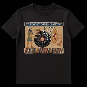 May include: Black t-shirt featuring a tapestry-style graphic. The graphic includes a bearded figure, a record, a gramophone, and the text "ET POSVIT ORBEM SANCTVM". The design incorporates various colors, including beige, brown, red, and blue.