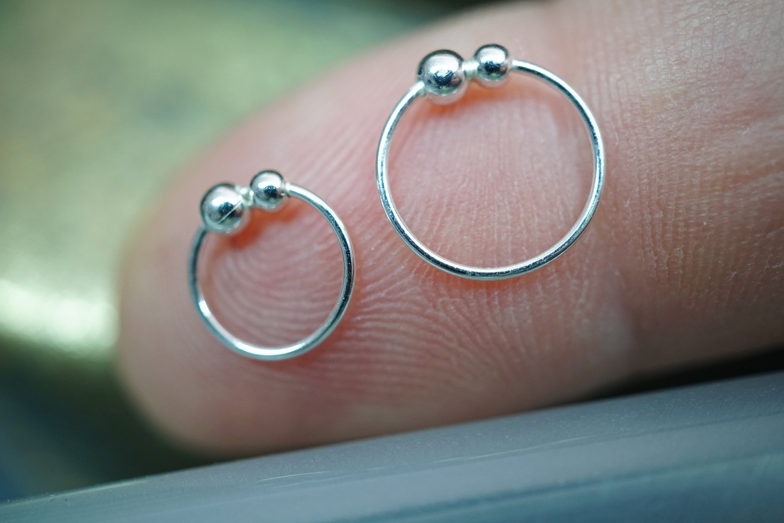 Nose piercing hotsell with two balls