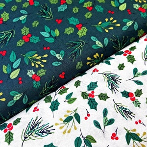 May include: Two fabric swatches with a repeating pattern of green holly leaves and red berries. The top swatch is a dark green background and the bottom swatch is a white background.