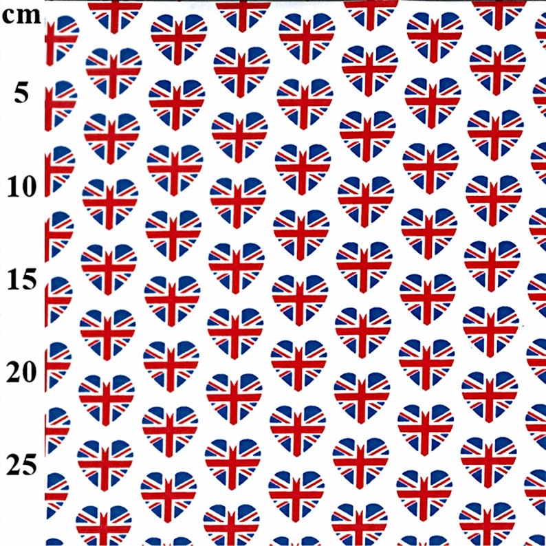 May include: White fabric with a repeating pattern of heart shapes. Each heart features the Union Jack flag design in red, white, and blue. The pattern is evenly spaced across the fabric.