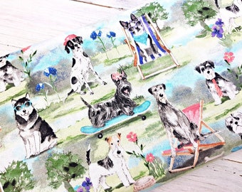 May include: A patterned fabric featuring a playful design of dogs in a park. The dogs are shown wearing sunglasses and hats, and relaxing on deckchairs. The design includes flowers, trees, and a light blue and green colour scheme.