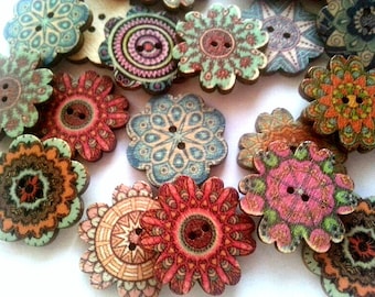 May include: Assortment of colourful wooden buttons with intricate floral designs. Each button features a two-hole design and a variety of colours, including blue, green, red, orange, and pink.