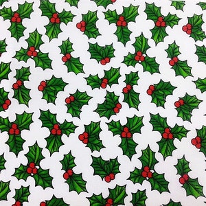 May include: A white background with a repeating pattern of green holly leaves with red berries.