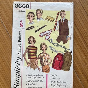 May include: A vintage Simplicity sewing pattern, number 3660, with illustrations of clothing items. Includes a girls' headband, boys' bow tie, clutch bag, tie, pull-over, scuffs, top, and duffel bags. The pattern is marked as medium and priced at 35c.