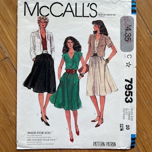 May include: McCall's sewing pattern number 7953 for a women's dress and jacket. The pattern is for sizes 10-32 1/2 and includes a bust cup size adjustment. The pattern is made for you and includes individual dart points.