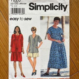 May include: Simplicity sewing pattern number 7220 for sizes GG (26W-32W). The pattern includes instructions in English, French, and Spanish. The pattern shows three different styles of dresses: a red dress with a jacket, a striped dress with a skirt, and a floral print dress.