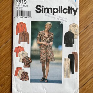 May include: A vintage Simplicity sewing pattern, showing a woman in a floral outfit. The pattern includes illustrations of jackets, skirts, and trousers. The pattern number is 7519, with size information.