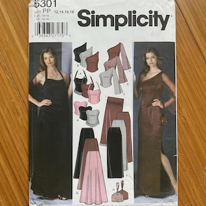 May include: Simplicity sewing pattern number 5301 for sizes 12, 14, 16, and 18. The pattern includes instructions for making a black, brown, and pink skirt, a black and grey corset, and a brown dress with a long, flowing sleeve.