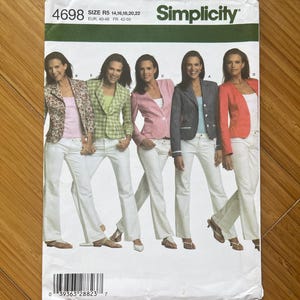 May include: Simplicity sewing pattern number 4698 for sizes R5 14, 16, 18, 20, 22, EUR 40-48, FR 42-50. The pattern shows five women wearing different jackets and white trousers.