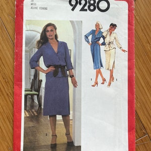 May include: Simplicity sewing pattern number 9280 for a miss or jeune femme. The pattern includes instructions for making a skirt and blouse with a tie belt. The model is wearing a blue skirt and blouse with a black belt. The pattern costs £2.75.