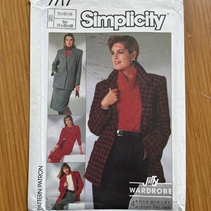 May include: Simplicity sewing pattern number 7717 for a Jiffy wardrobe with four easy pieces. The pattern includes a red and black checked blazer, a red turtleneck sweater, a red dress, and a grey skirt suit. The pattern is for sizes 10-12-14 and 38-40-42.