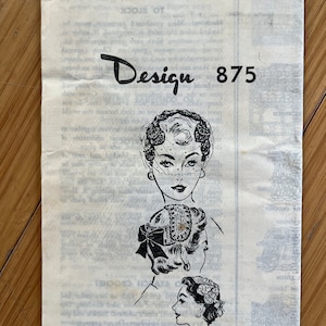 May include: Vintage crochet hat pattern, Design 875, with illustrations of three women wearing different styles of hats. The pattern is for crocheted hats.