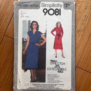 May include: A Simplicity 9081 sewing pattern envelope for a dress. The front features a photograph of a person in a blue dress and an illustration of a person in a red dress. Text includes "PATTERN/PATRON", "Simplicity 9081", and "time saver STRETCH knit".