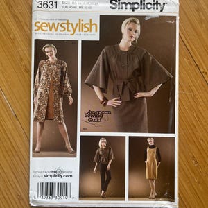 May include: Simplicity sewing pattern number 3631 for sizes 14-22. The pattern includes instructions for making a brown jacket with a belt, a brown dress, and a brown coat. The pattern is from the Sew Stylish collection, which is a line of patterns designed for beginners.