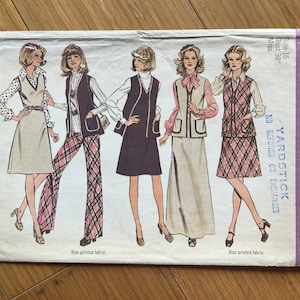May include: Simplicity sewing pattern number 5525 for a women's vest and skirt. The pattern includes four different styles, all featuring a bias printed fabric. The pattern is for sizes 16, bust 38 inches.