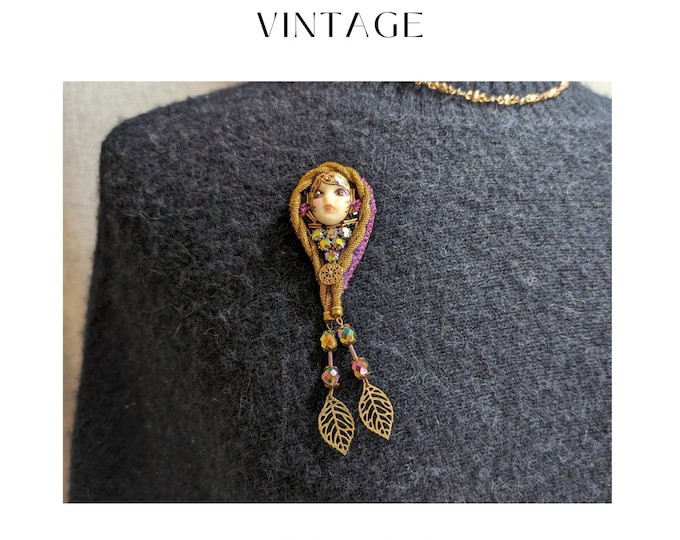 Enchanting Vintage Beadwork Artisanal Brooch with Porcelain Doll Face