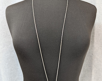 Beautiful  Silver-tone Long Charm Necklace by French connection Jewellery