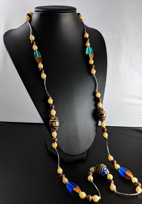 Long Unusual Plastic, Glass and Wood Necklace Circ