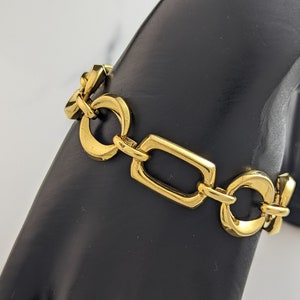 Bellissimo bracciale vintage con catena traforata color oro di Sarah Coventry