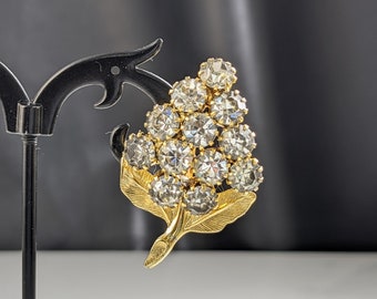 Mooie vintage sieraden goudkleurige bloembroche