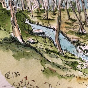 May include: Watercolor painting of a stream flowing through a forest. The stream is light blue and the trees are brown with green foliage. The painting is signed with the date "6.1.23".