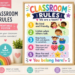 May include: A classroom rules poster in a wooden frame featuring five numbered points with colorful illustrations. The text reads: Classroom Rules, We are a team!, Be kind and friendly, Listen when others talk, Keep hands, feet, and objects to ourselves, Take care of our classroom and each other, Have fun and do your best!, and You belong here!.