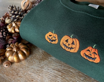 Embroidered Pumpkin Face Halloween Sweatshirt: Unisex Eco Jumper