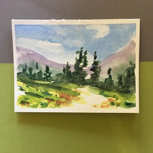 Aquarelle originale, carte de voeux, montagnes Rocheuses, fleurs sauvages, paysage de randonnée d'été. Jolie carte de remerciement et cadeau pour elle