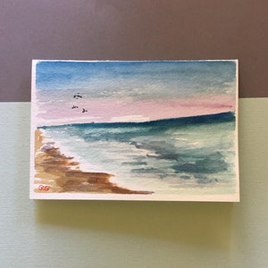 Biglietto d'auguri originale ad acquerello dipinto a mano, pittura. Spiaggia e tramonto rosa. Biglietto vuoto per Pasqua, battesimo, ringraziamento e altro!