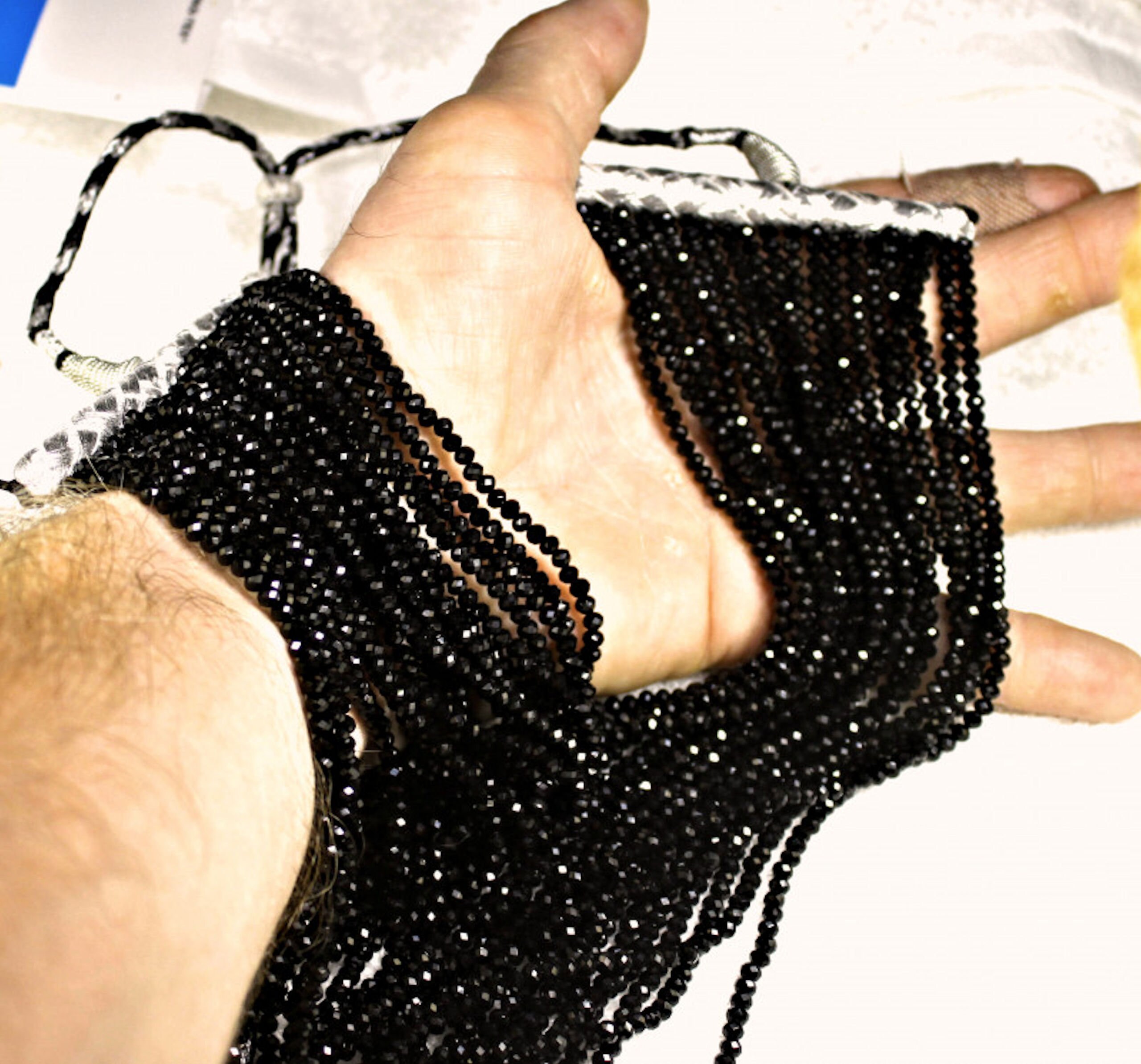 926.0 Tcw. Faceted 20 Strand Black Spinel Necklace