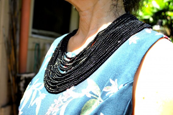 926.0 Tcw. Faceted 20 Strand Black Spinel Necklace