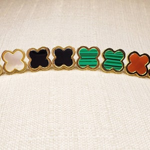 12mm four leaf clover studs in various colors. 18k gold plated sterling silver