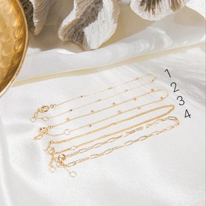 14k solid gold chain bracelets in various styles