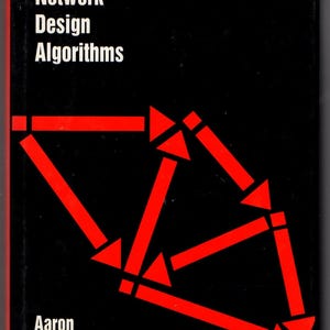 May include: A black hardcover book titled Telecommunications Network Design Algorithms by Aaron Kershenbaum. The cover features a geometric graphic design composed of bright red lines and triangles arranged in a network-like pattern.