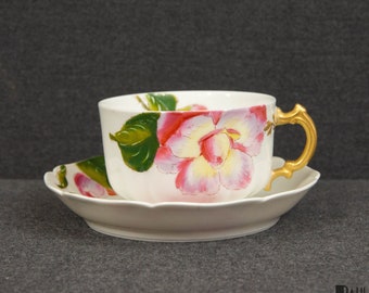 A Rare Haviland Limoges Teacup and Saucer with a Decoration of Pink Flowers and Ample Gilding