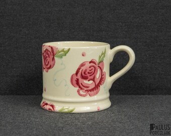 A Emma Bridgewater Mug with a Decoration of Pink Roses