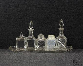A Unique Cut Crystal Tabel Set, Pepper and Salt set, Cruet Set ( chip on the rim of the underplate)