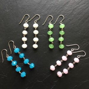 Ladies fun long drop sparkling milky Swarovski earrings perfect for dressing up any outfit Day/evening fashion wear
