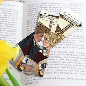 May include: Two bookmarks with illustrated images of a couple looking at each other. The bookmarks feature quotes from the book "Me Before You" by Jojo Moyes. The quote on the left bookmark reads "Me plonger dans un roman, c'est men échapper." The quote on the right bookmark reads "Me plonger dans un roman, c'est men échapper."