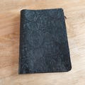 Embossed leather wallet insert for Traveler's Notebook product logo