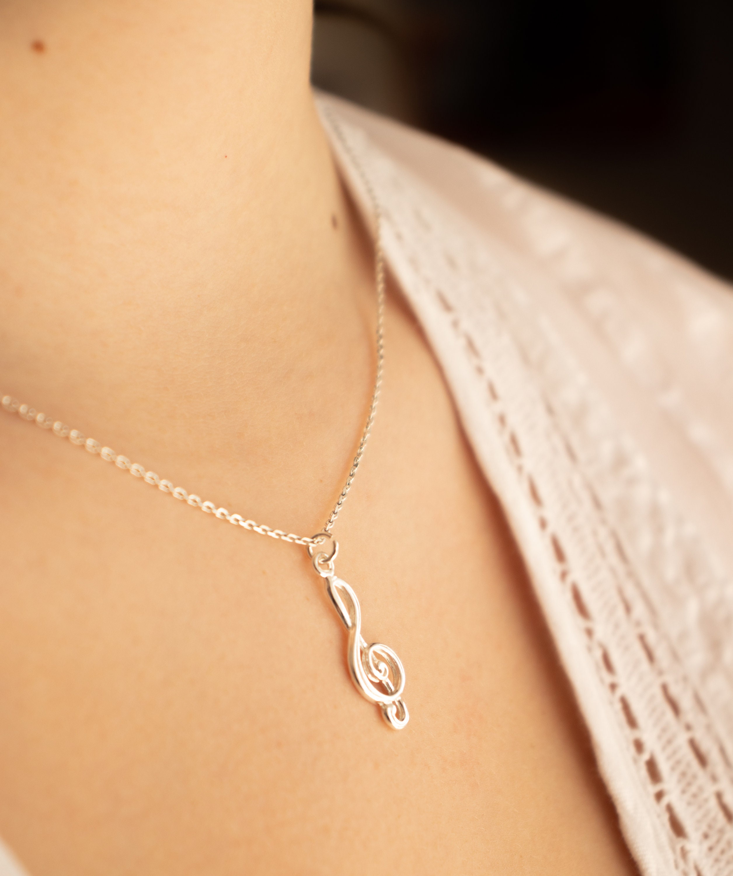 Collana con cordino in pelle, ciondolo a forma di chiave di violino, musica, gioielli da uomo, unisex, con chiusura a moschettone in acciaio inossidabile, regalo per uomo e donna, chiave di violino