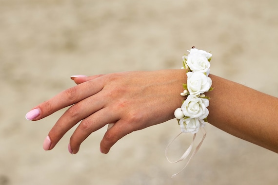 Blue and white wrist corsage on silver diamante bracelet - Florabunda