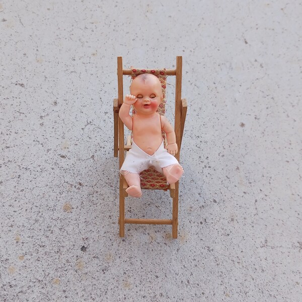 Antique Plastic Celluloid Baby with Movable Eyes Arms Legs in Wooden Highchair Toy. Stenciled Germany. Baby marked OSKAR Made in Italy.