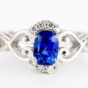Top Grade 18KT WG 1.45 CT Sri Lanka Blue Sapphire 0.14 ct Diamond Ring, Stamped