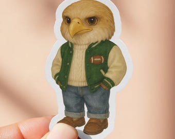 May include: A sticker featuring an anthropomorphic eagle wearing a green and cream varsity jacket, a cream sweater, blue jeans, and brown shoes. The eagle has a serious expression and is standing upright.