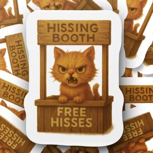 May include: A sticker featuring an orange cat with an angry expression inside a wooden booth. The booth has a sign that reads "HISSING BOOTH" and "FREE HISSES". The cat is the central focus of the sticker.