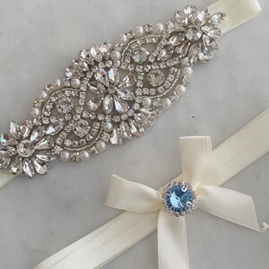 Bridal Garter Set With Rhinestone Applique And Blue Gem Bow - Ivory Wedding Keepsake & Toss Garter Set For Bride Something Blue Gift