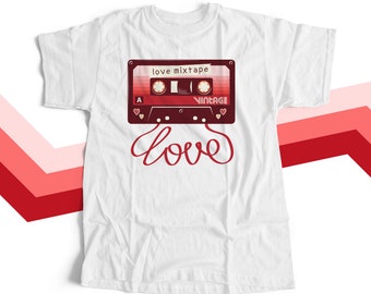 May include: White t-shirt with a red and white cassette tape graphic and the text "love mixtape" and "vintage". The word "love" is written in red cursive below the cassette tape.