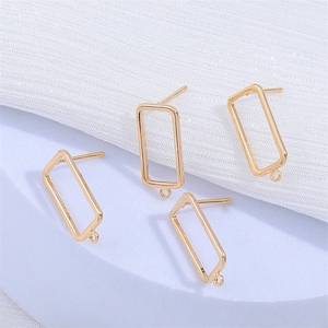 May include: Three gold-toned rectangular earring blanks with jump rings. Each blank has a post for attaching to an earring.